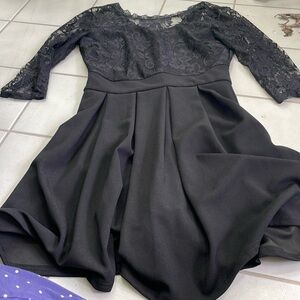 Black lace top dress. 3/4 sleeve. Size M. NWOT.